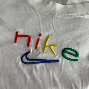 Nike white dri-fit semi cropped embroidered tee